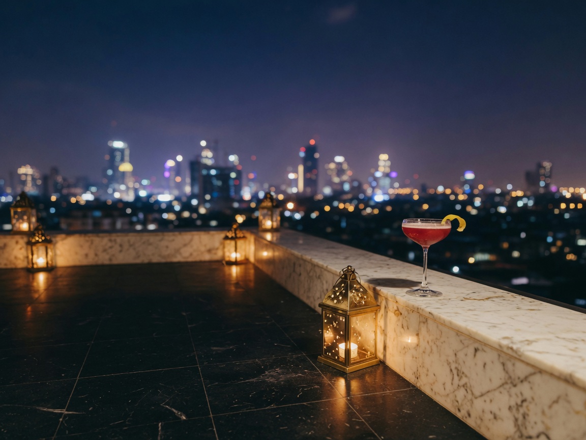 Rooftop terrace at night, lanterns and a cocktail against a city skyline